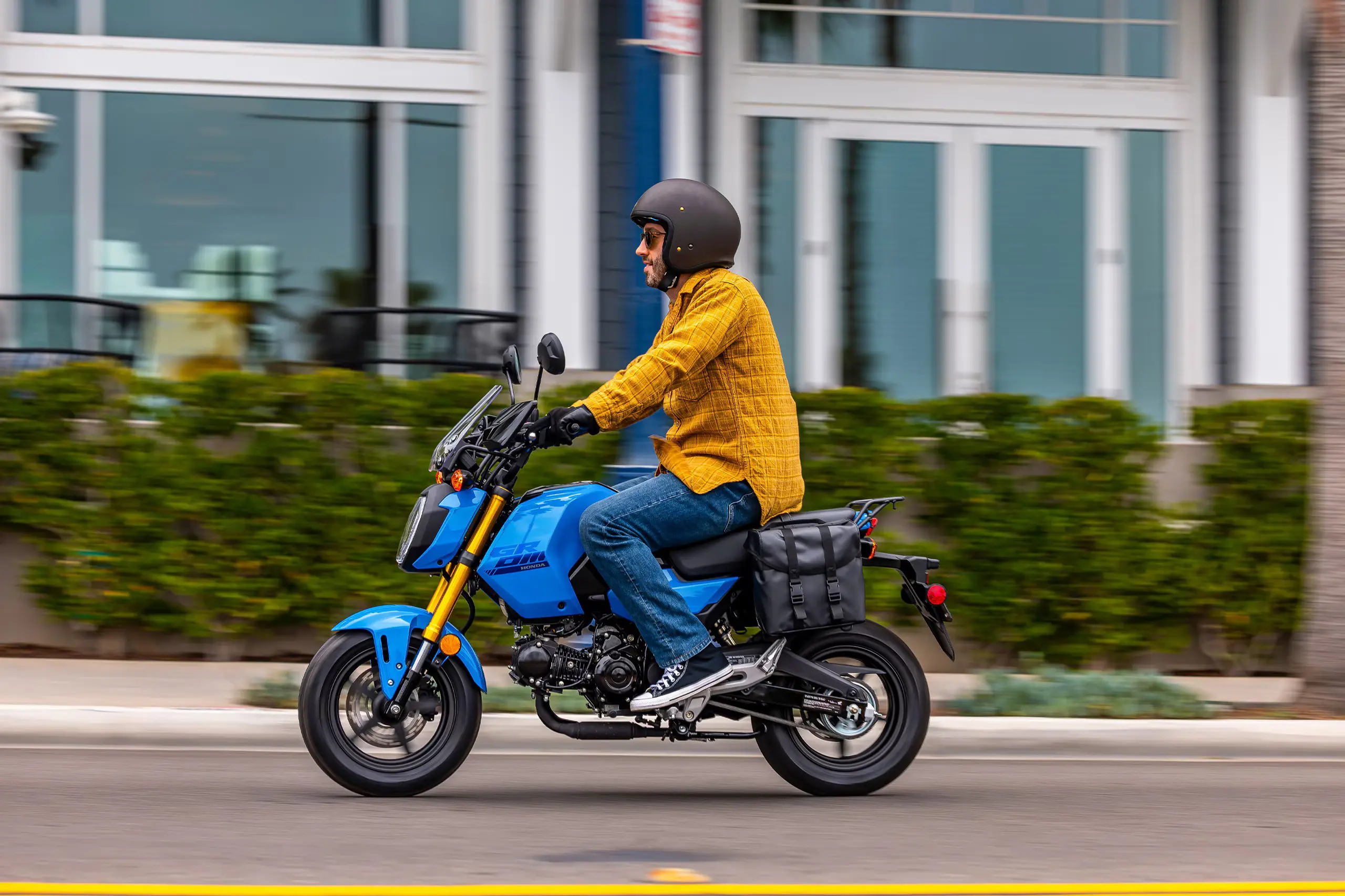 man riding honda grom
