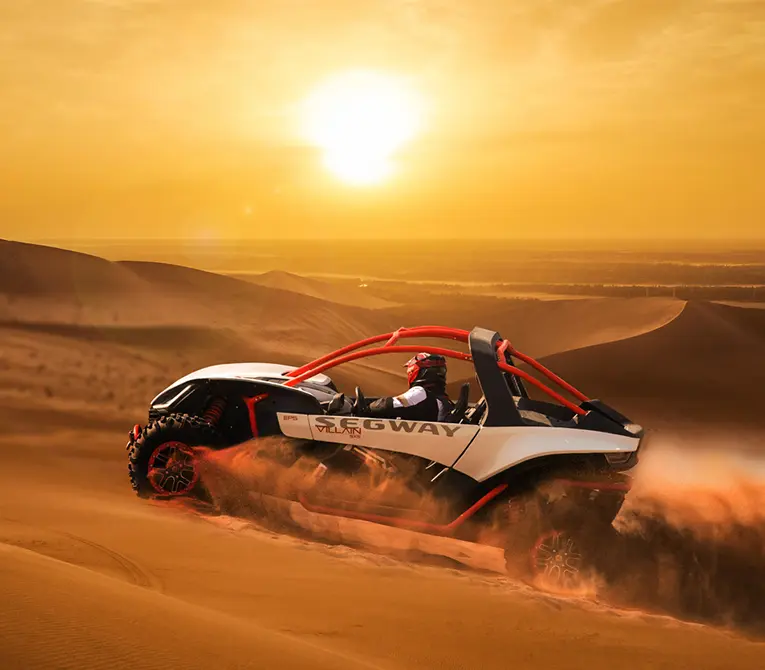 segway villian driving through sand dunes