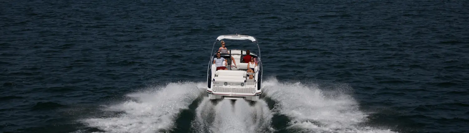 family riding on a formula 270 bowrider