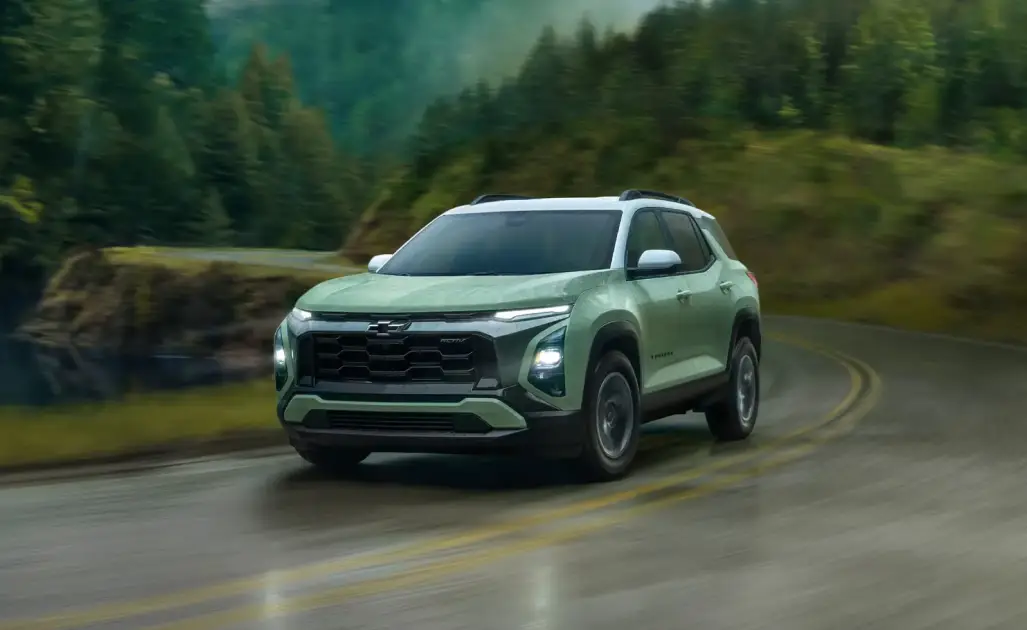 Chevrolet Equinox driving on a scenic mountain road
