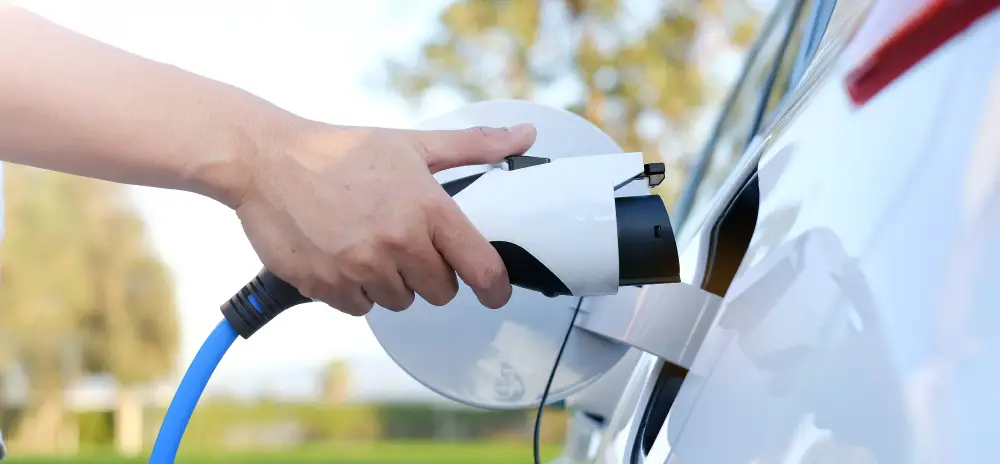 Electric vehicle being connected to a charging cable
