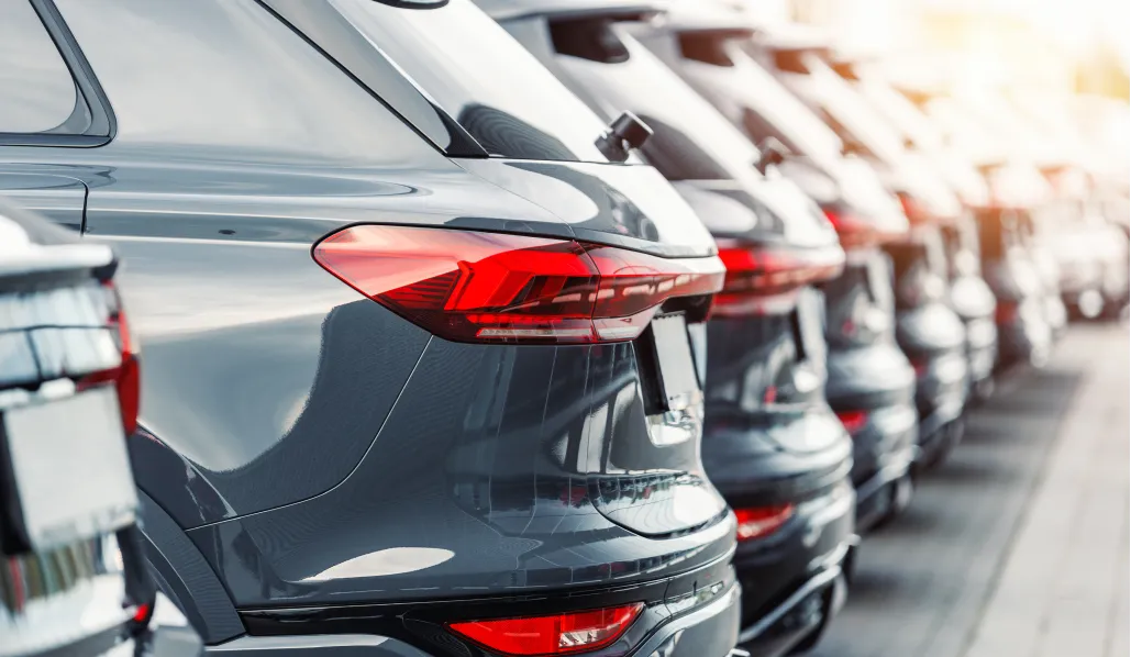 Row of vehicles at a family-owned Emich Automotive dealership in Colorado
