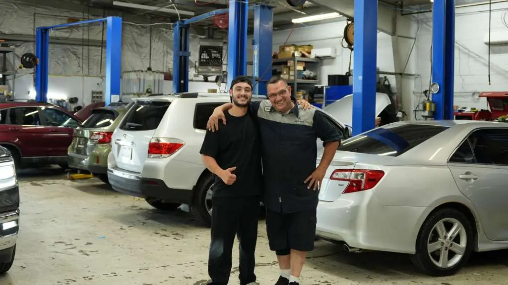 Technicians Scott and his son Sean at Grace Auto Repair