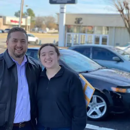 Happy Grace Auto Sales customer with a new vehicle in Richmond, VA