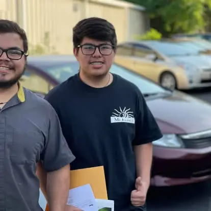 Happy Grace Auto Sales customer picking up a vehicle purchase in Richmond, VA