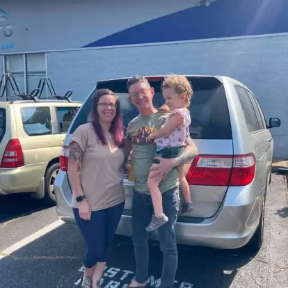 Happy Grace Auto Sales customer with a new vehicle in Richmond, VA