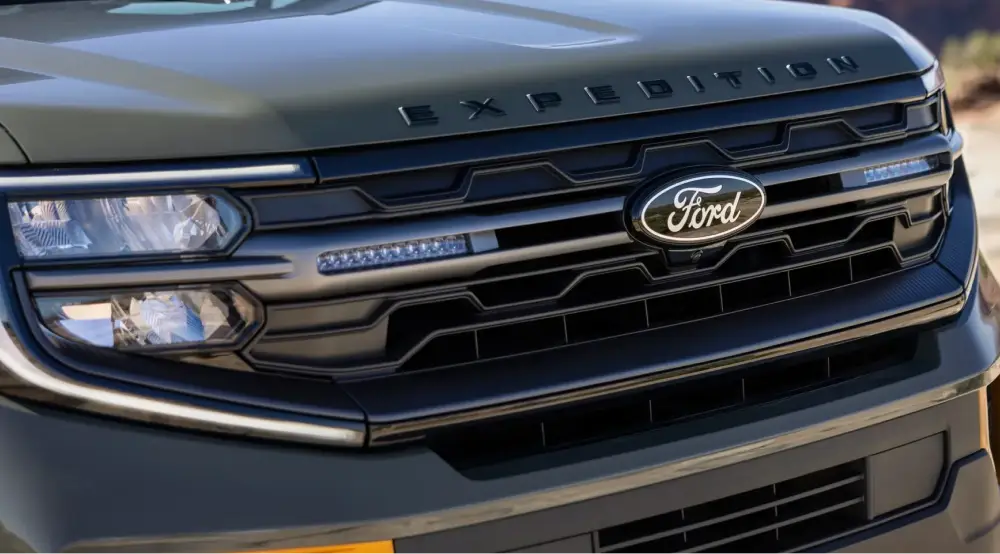 Close-up of a Ford grille and badge