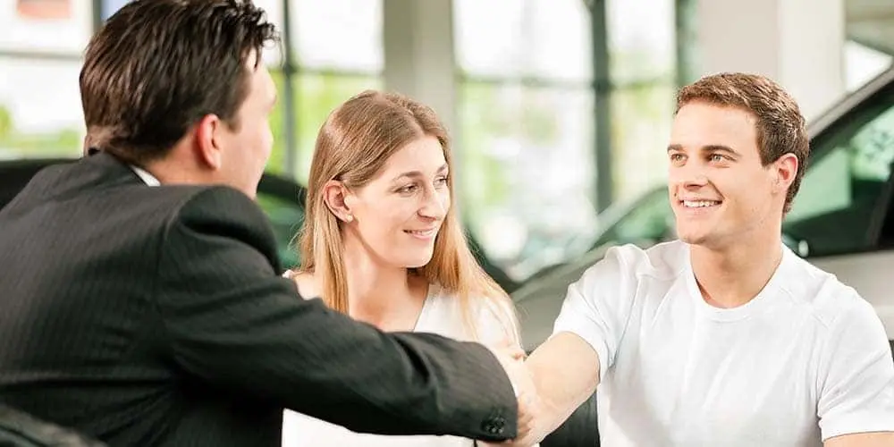 Two men shaking hands.