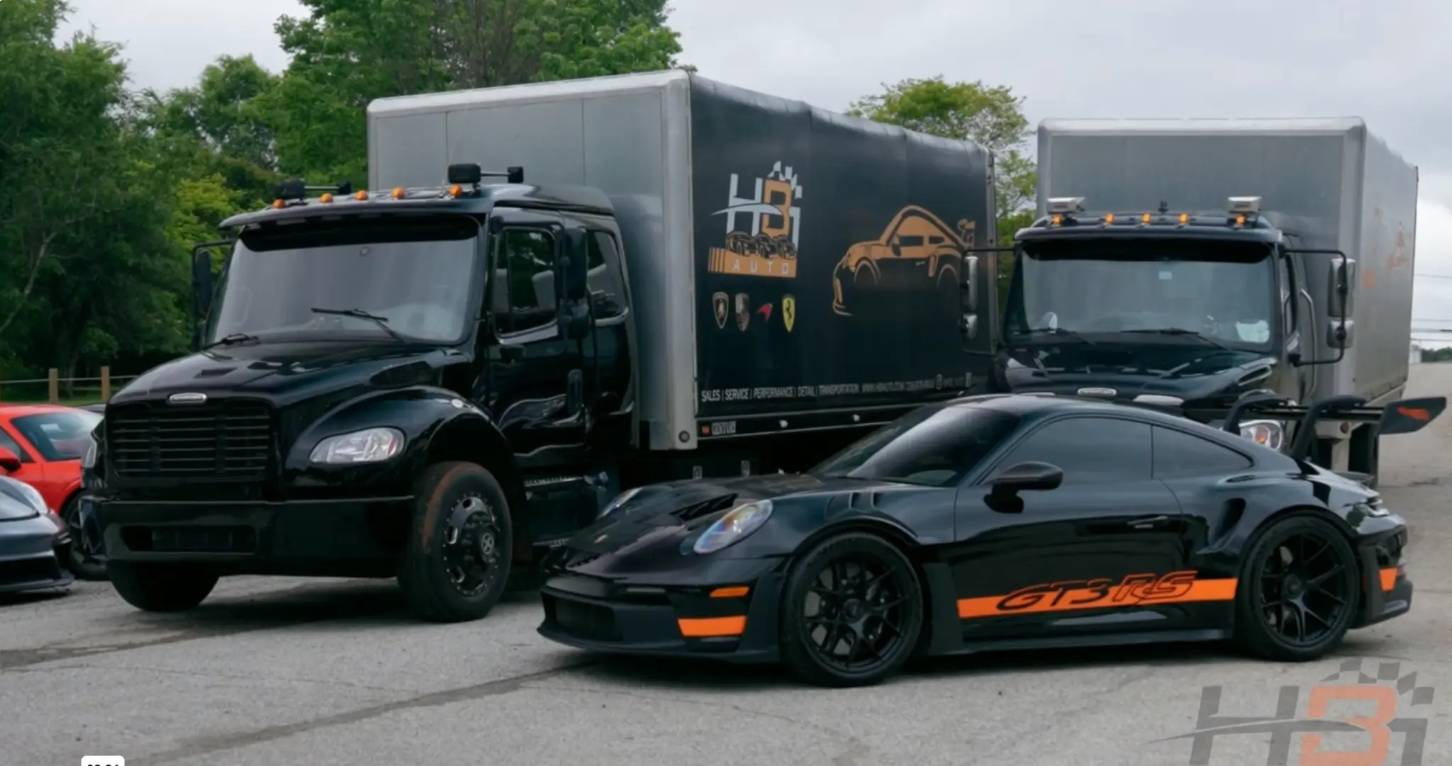 HBi enclosed trailer transporting a Porsche
