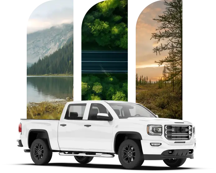 White pickup truck with scenic outdoor panels featuring mountains, forest, and road imagery.