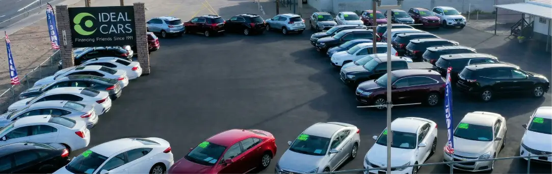 Used car dealership exterior storefront Ideal Cars Apache Junction