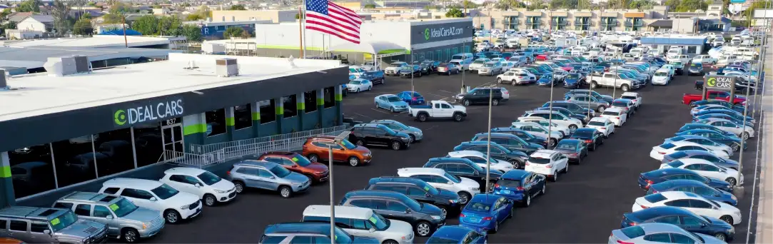 Used car dealership exterior storefront Ideal Cars Main