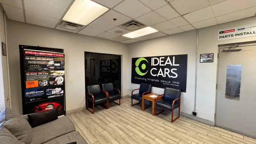 Comfortable customer waiting area inside the Ideal Cars service center in Mesa, AZ.