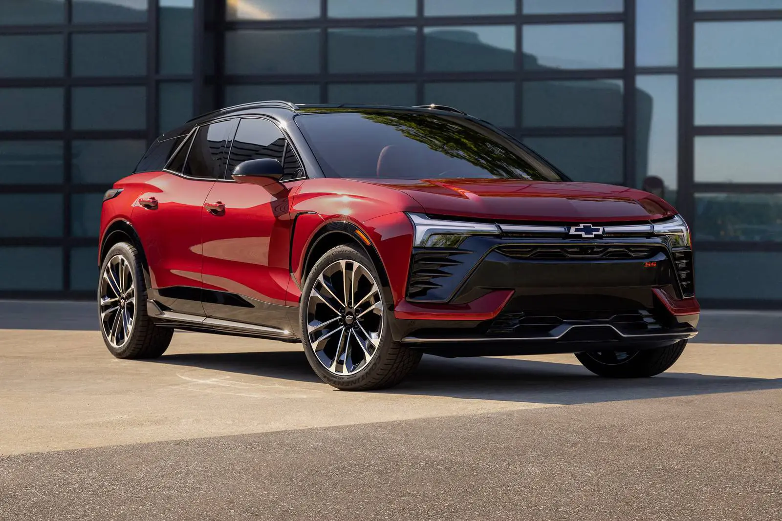 A red chevy blazer ev sitting parked.