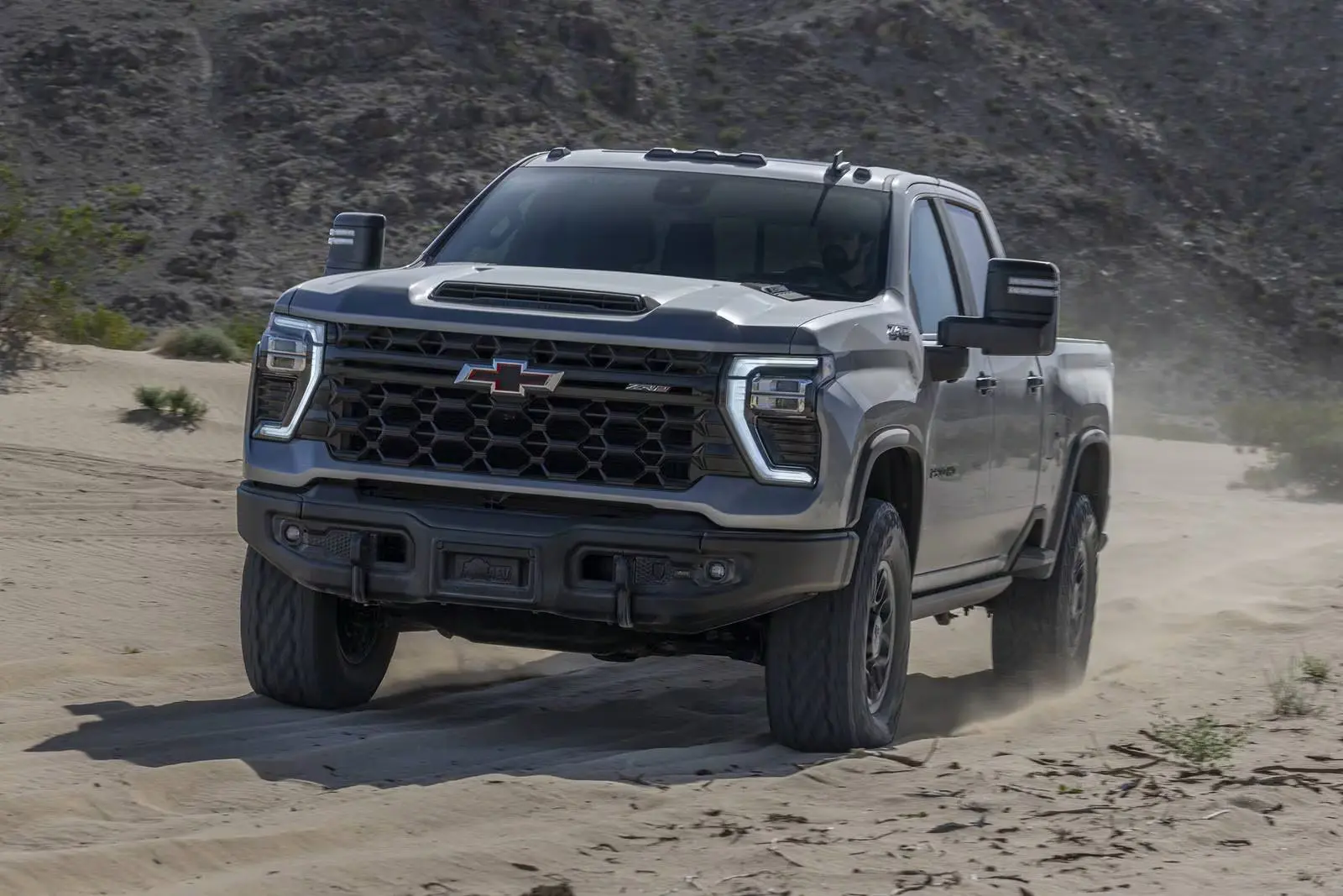 A silverado 2500 hd driving off-road.