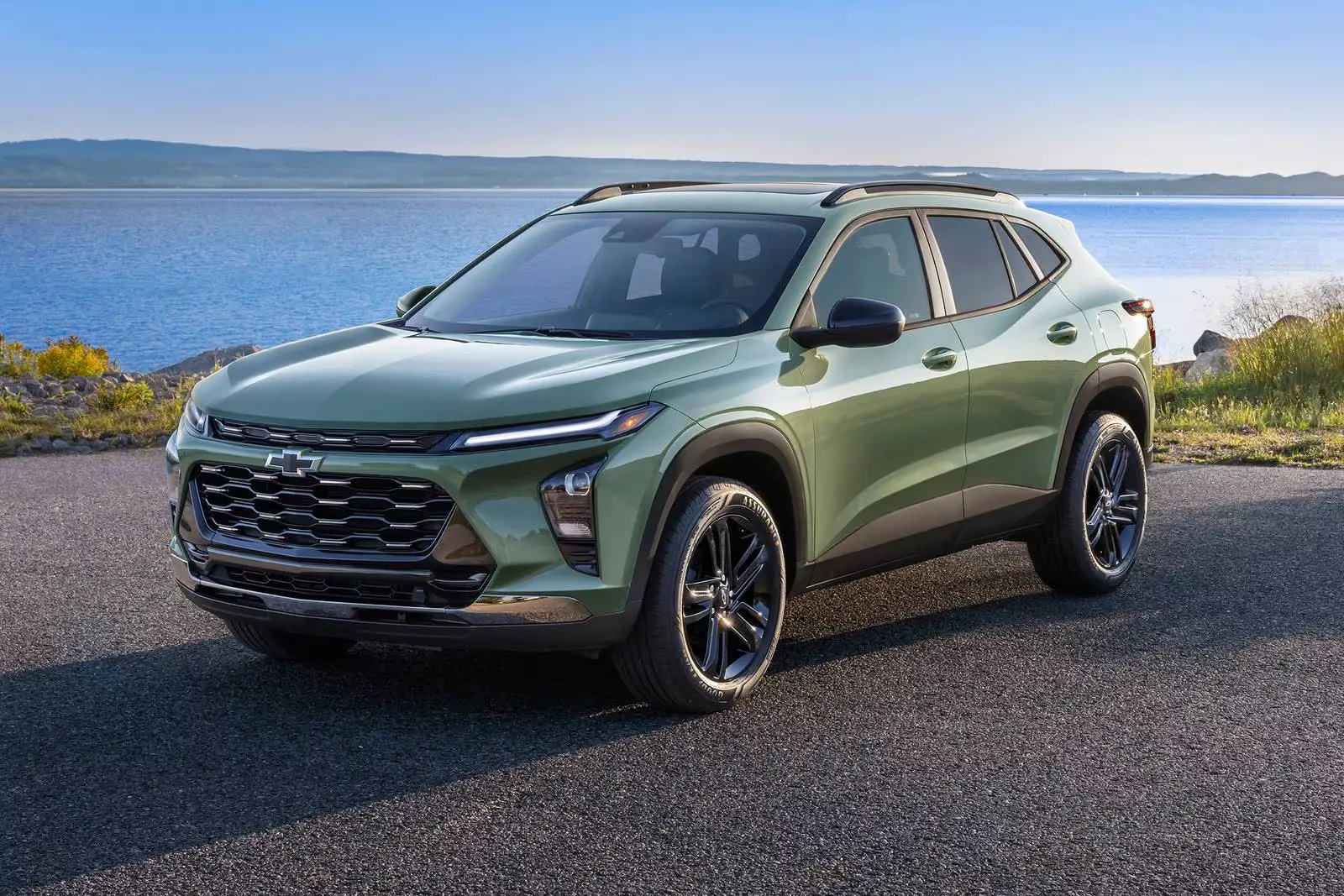 A gray suv sitting parked.