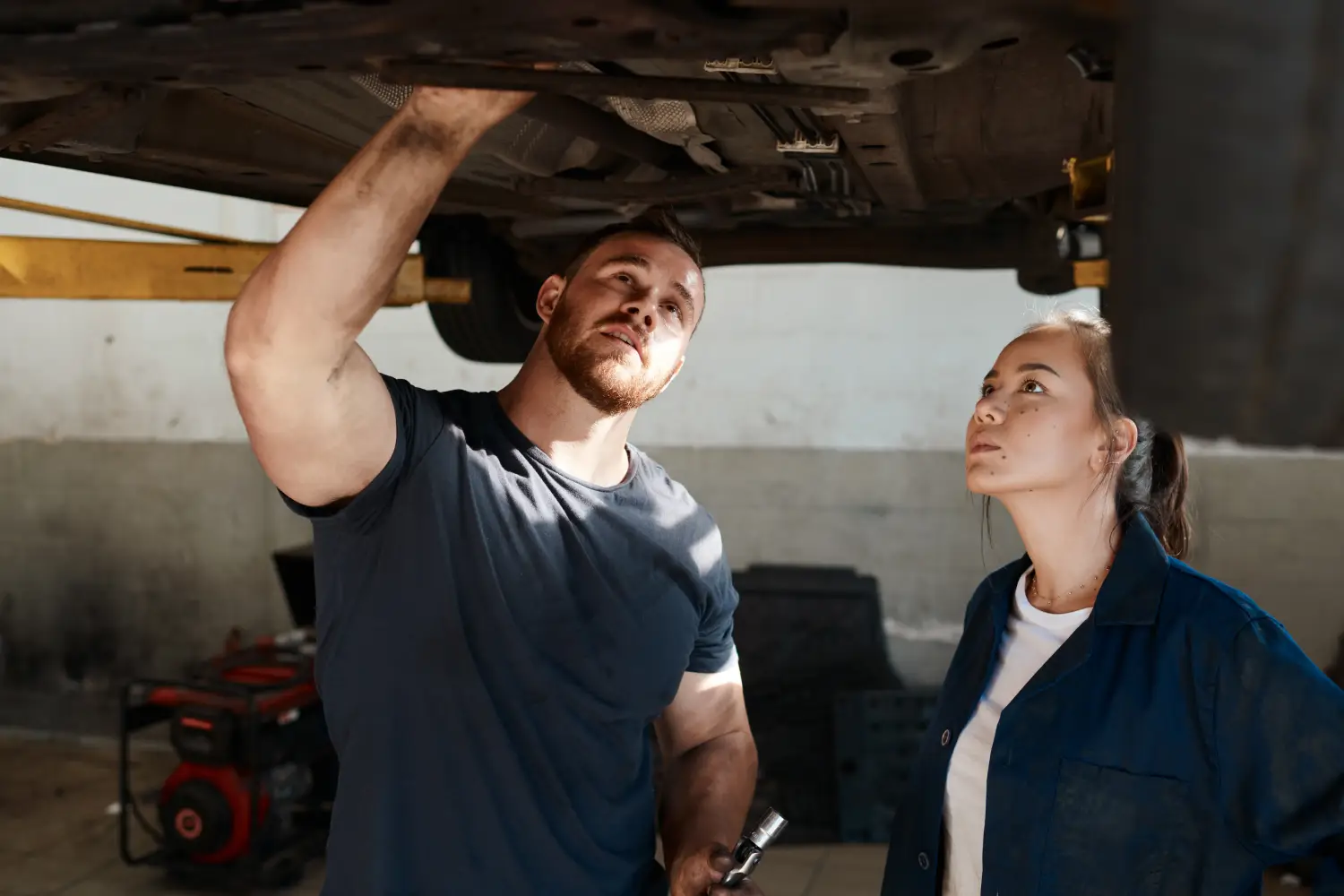 Technician performing engine diagnostics at Joe's Car and Truck Repair in Colorado Springs, CO