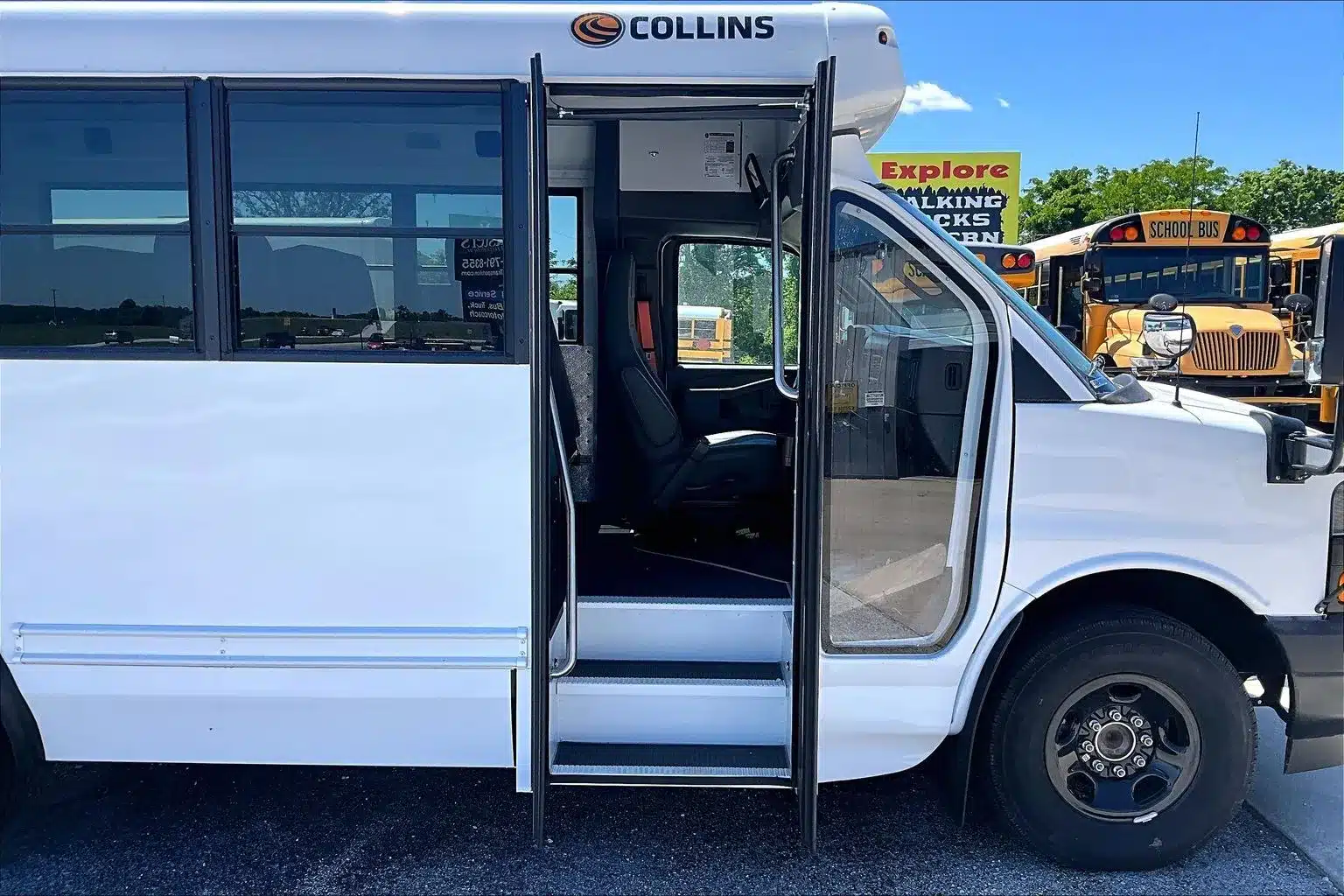Driver assisting a passenger using an ADA-compliant wheelchair lift