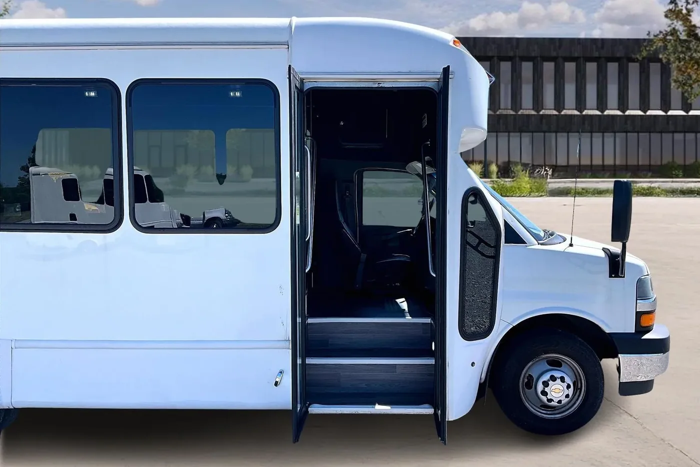 Chevrolet shuttle bus with passenger door open