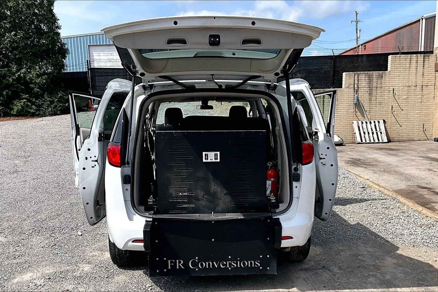 Chrysler rear-entry wheelchair van conversion with the liftgate open and ramp stowed