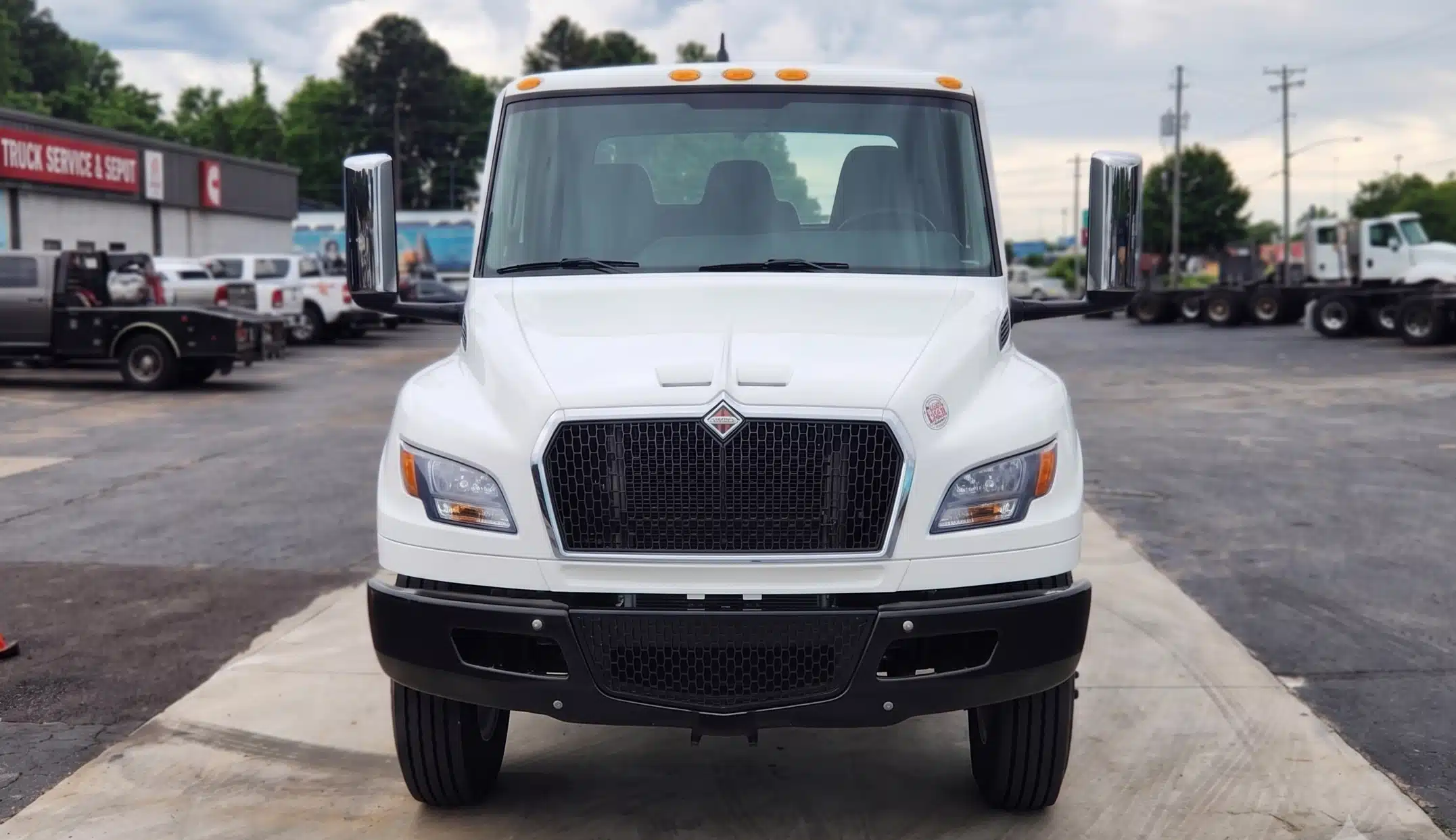 Front view of a white International MV Series cab chassis