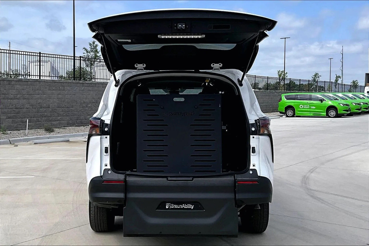 Toyota Sienna rear-entry wheelchair van with the liftgate open and ramp stowed