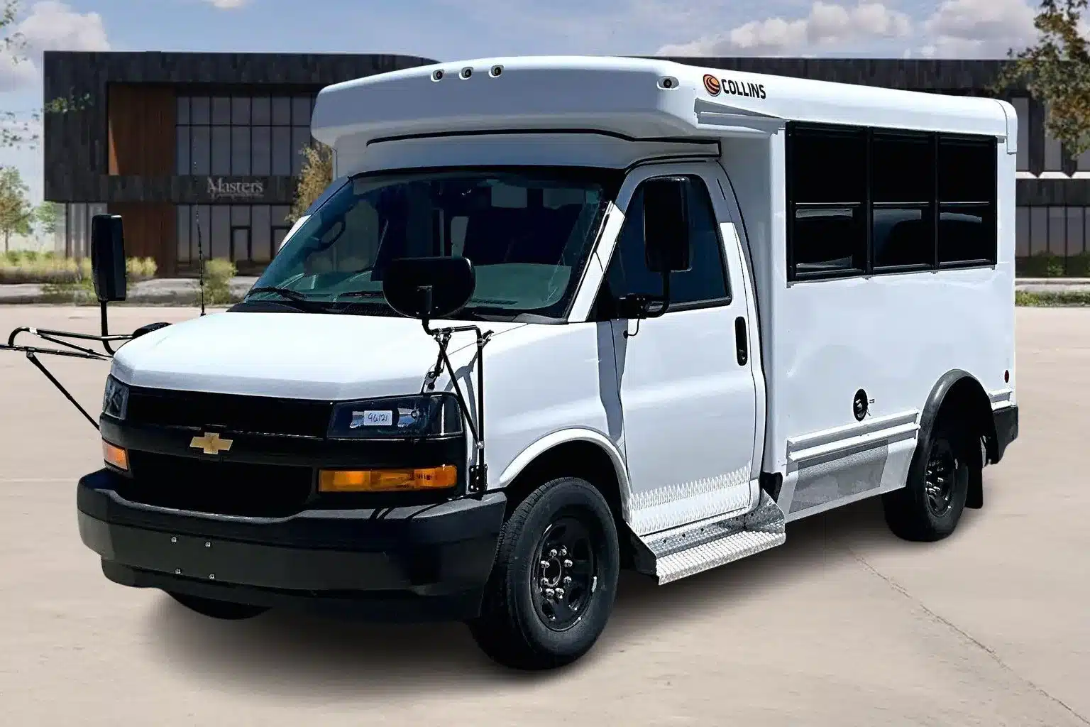 Mechanics servicing a commercial vehicle