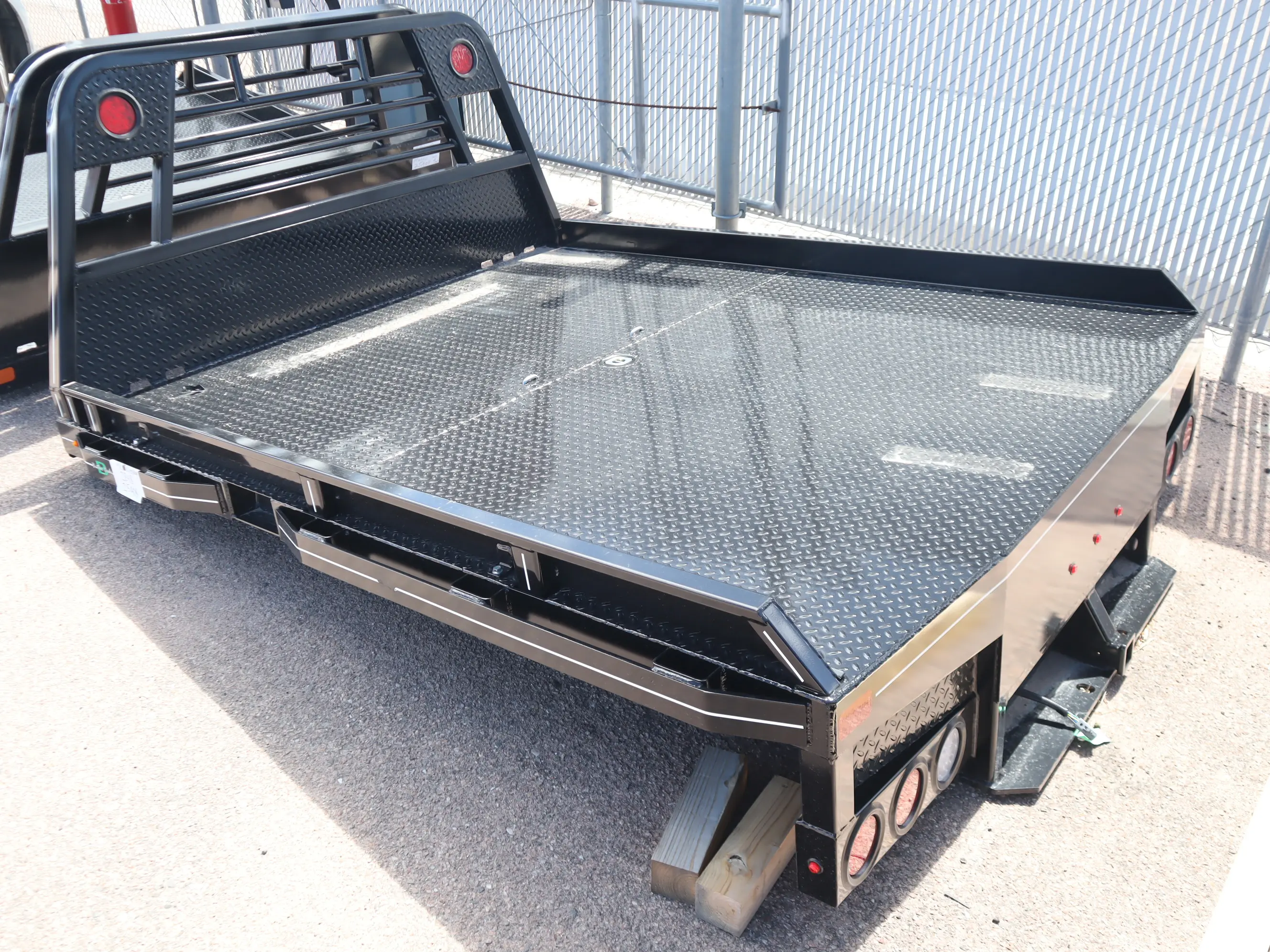84 x 102 non-skirted Butler flat bed unit 4, driver-side profile view