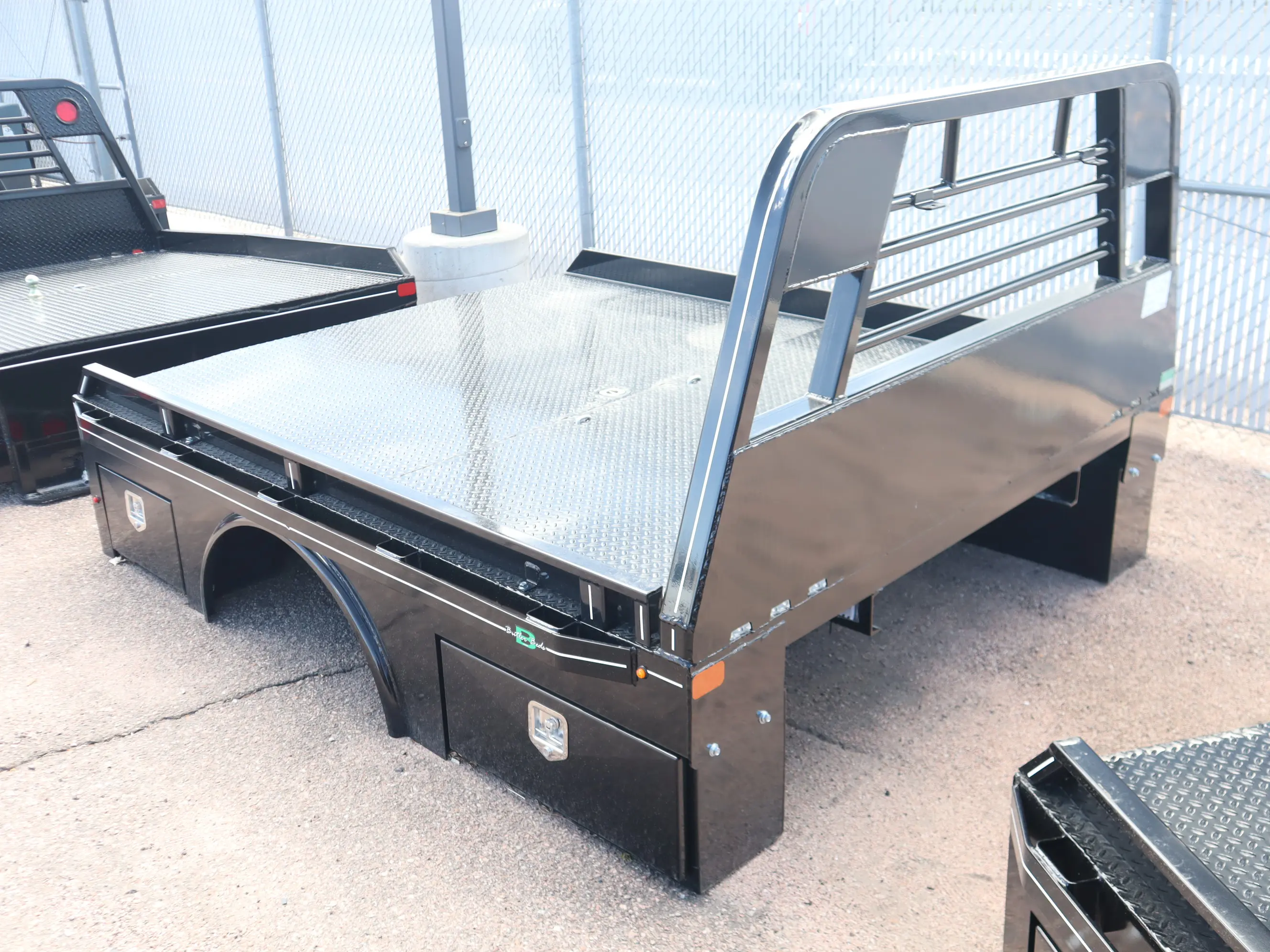 84 x 102 skirted Butler flat bed, passenger-side profile view