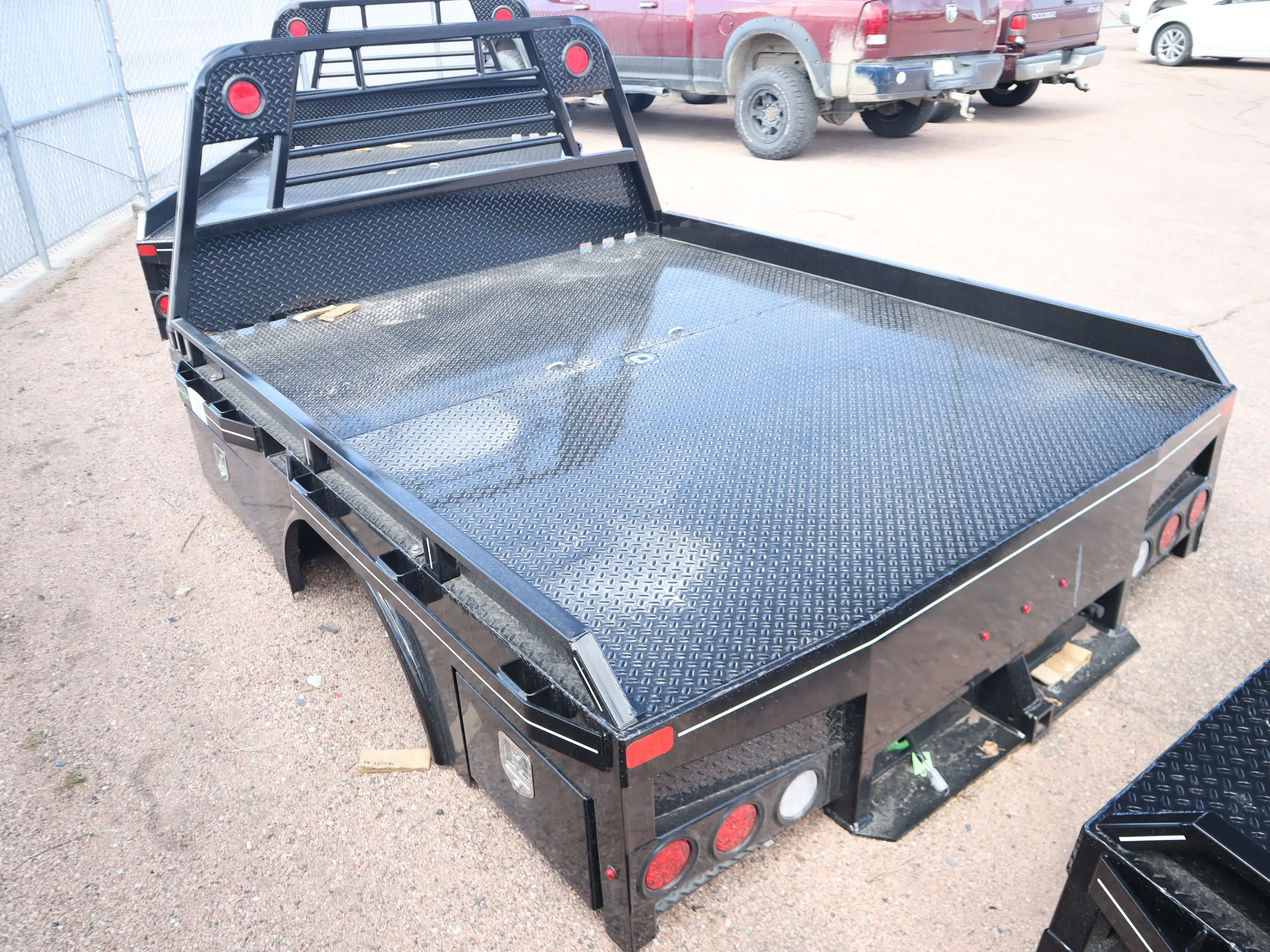 84 x 102 skirted Butler flat bed, deck and headache rack detail
