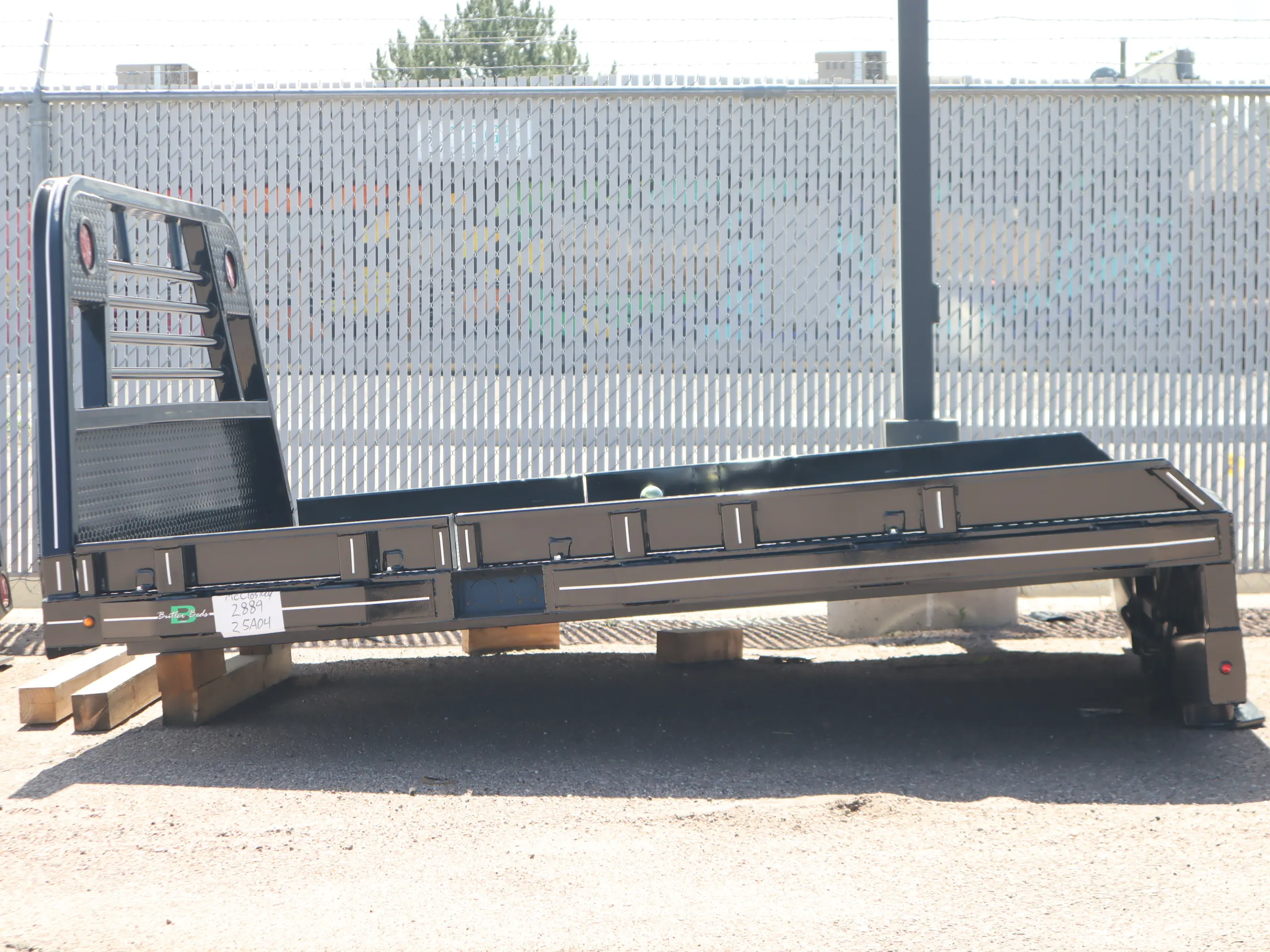 94 x 102 non-skirted Butler flat bed, driver-side profile view