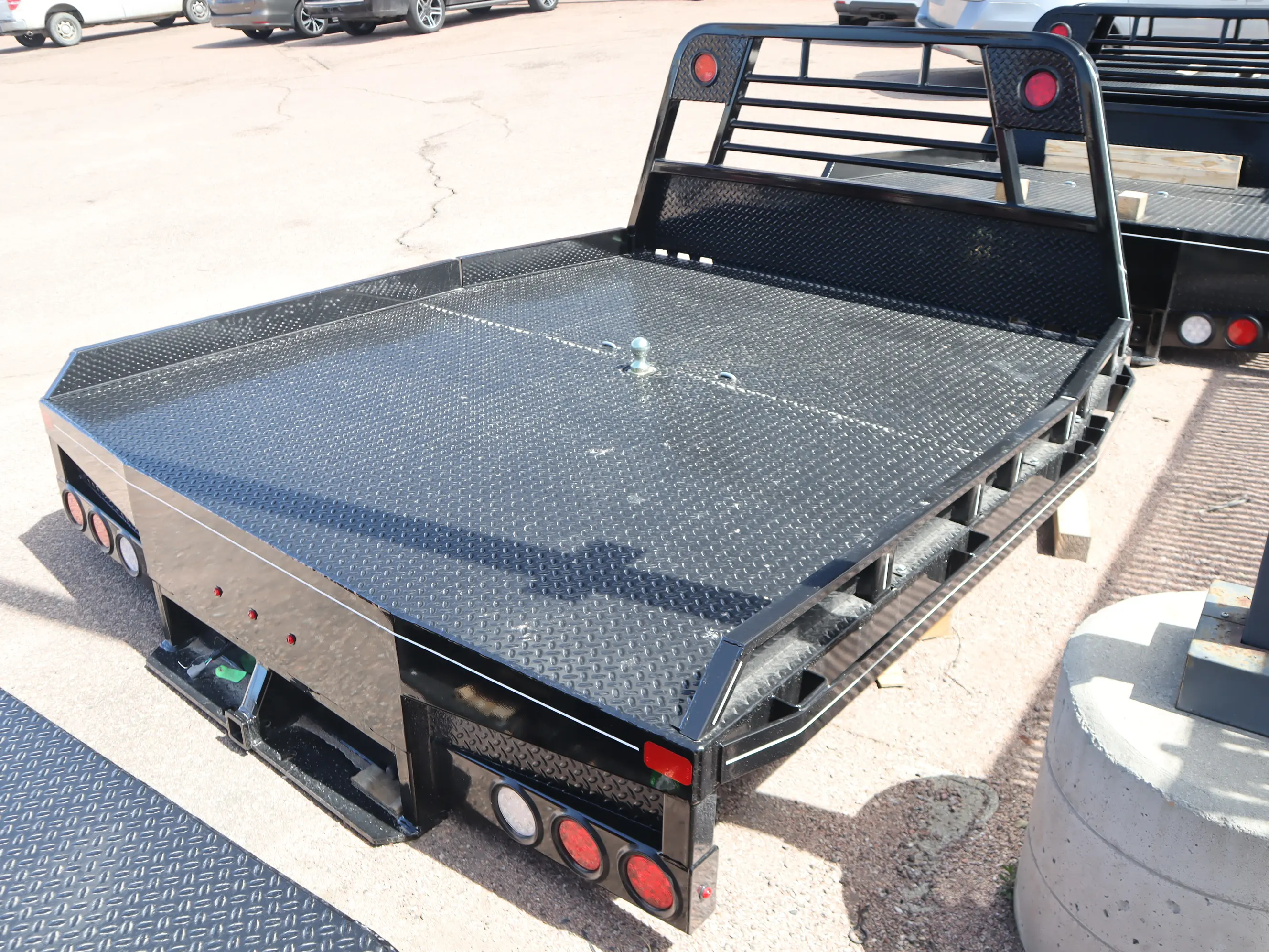 94 x 102 non-skirted Butler flat bed, dual wheel and frame detail