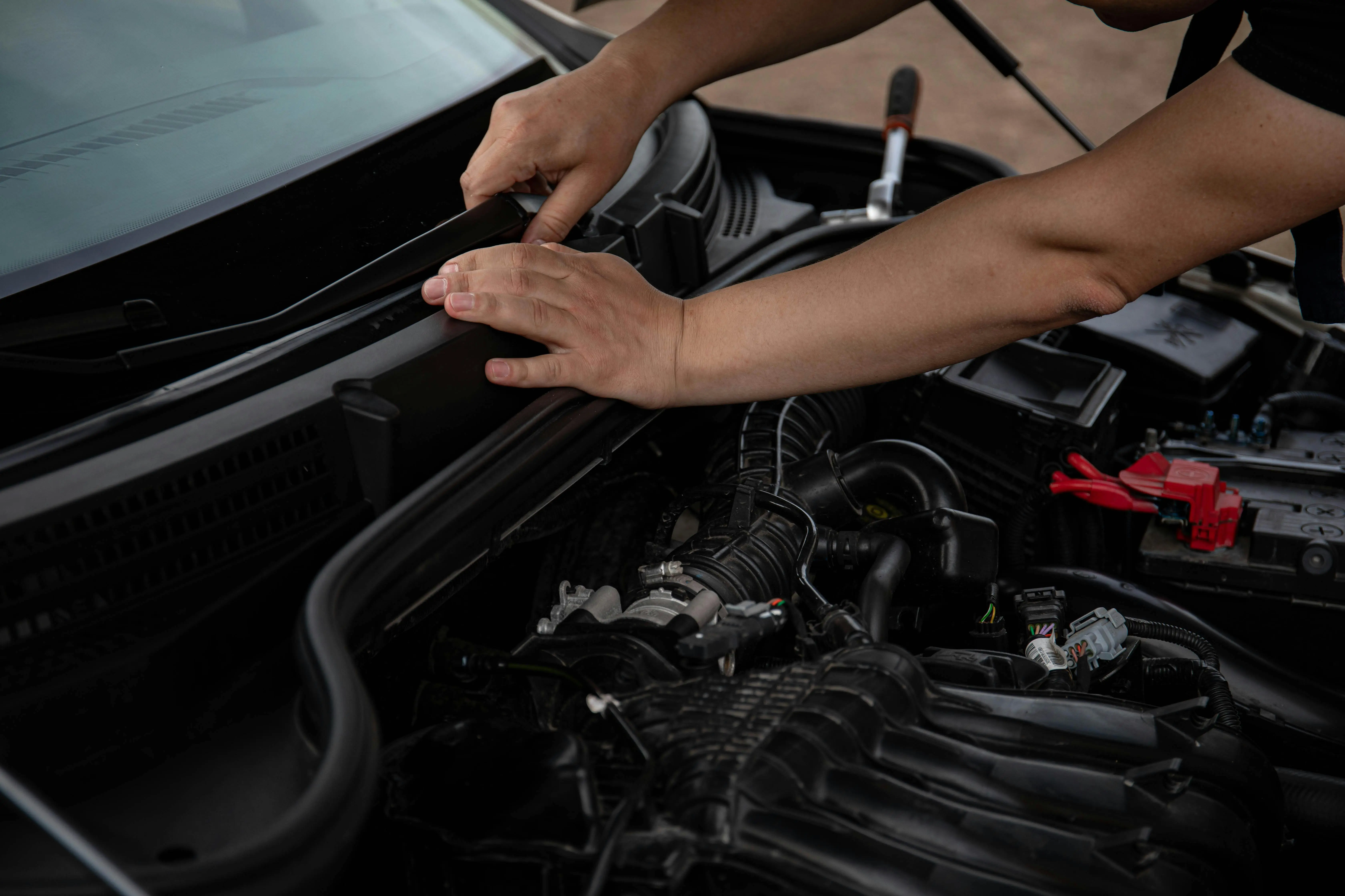 Wiper blades being replaced.
