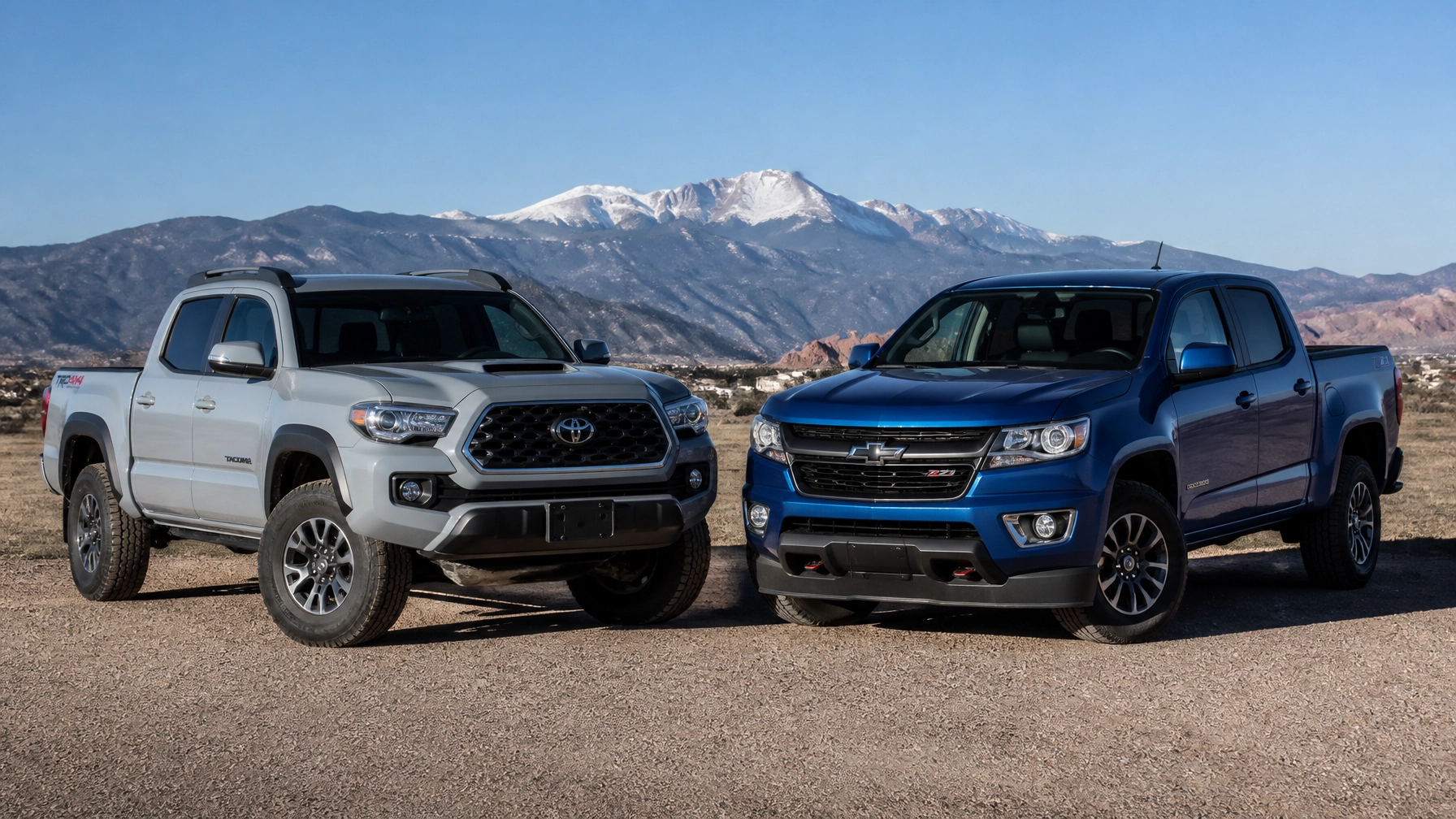 2021 Toyota Tacoma and 2021 Chevy Colorado at McCloskey Truck Town in Colorado Springs CO