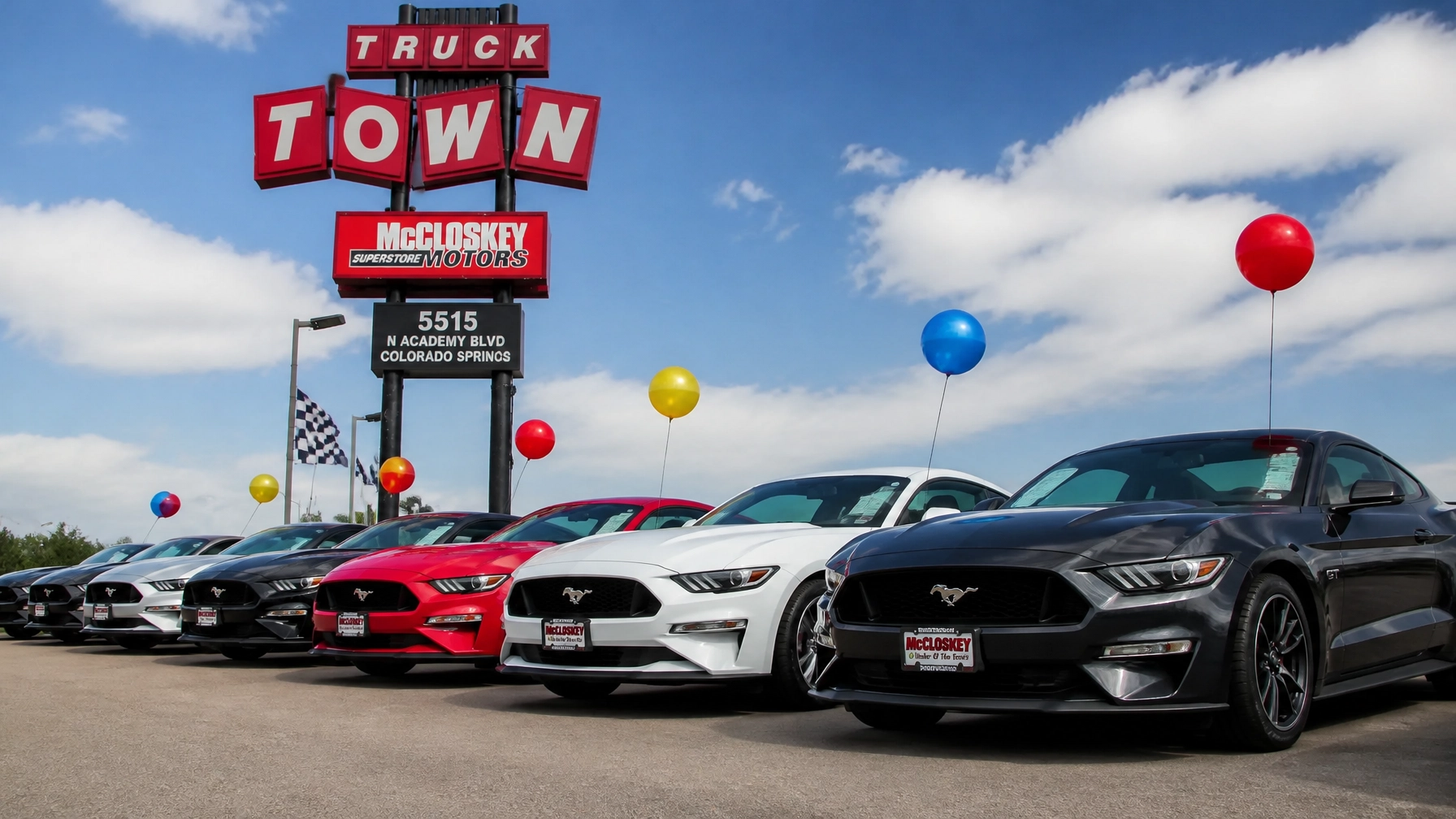 Diverse lineup of pre-owned trucks and SUVs including a Toyota Tacoma and Jeep Wrangler
