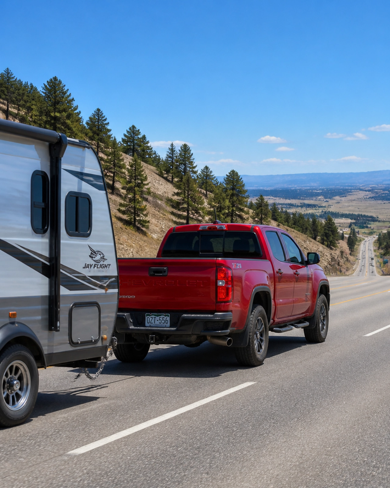 2023 Chevrolet Colorado Z71 towing a trailer at McCloskey Truck Town in Colorado Springs CO
