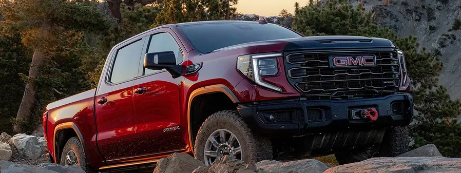 GMC Sierra AT4X off-roading on rugged terrain