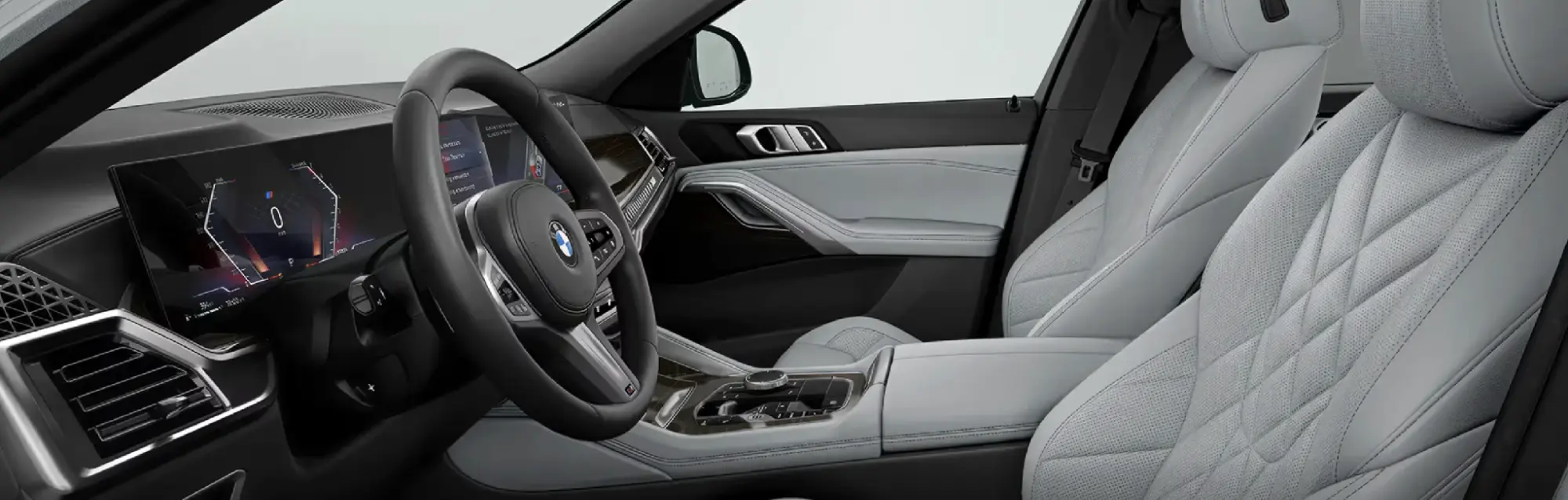 Clean BMW interior with leather seats and dashboard air vents, the kind of fresh cabin a new air filter helps maintain