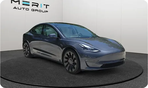 Tesla electric vehicle on a studio turntable