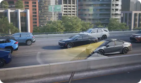 Toyota Camry driving in stop-and-go freeway traffic