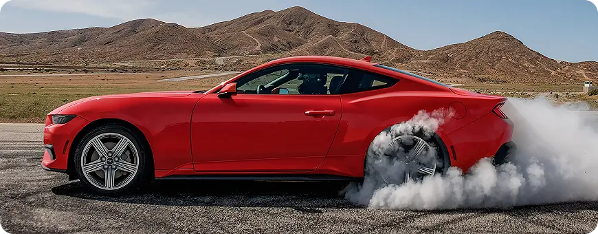 Ford Mustang performing a burnout with line-lock engaged
