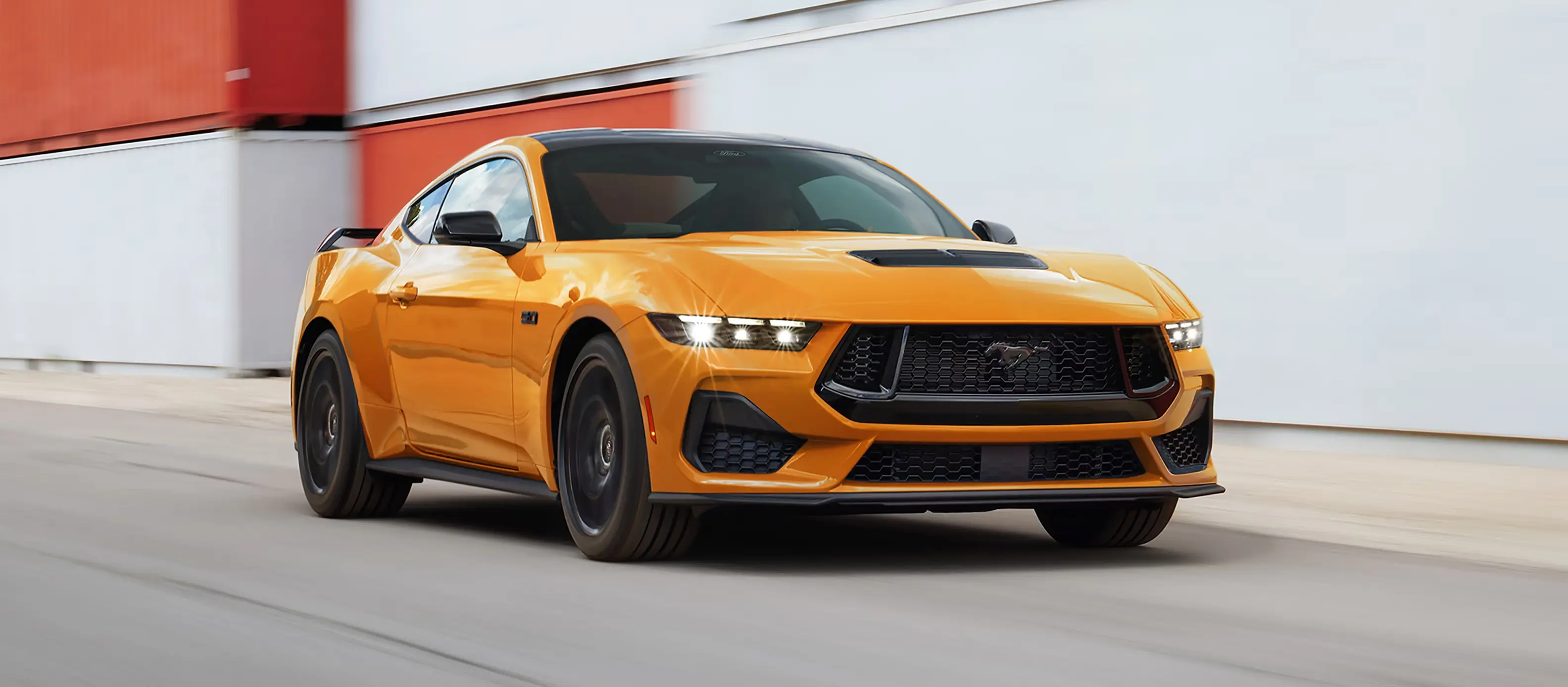 Ford Mustang sports car on the road