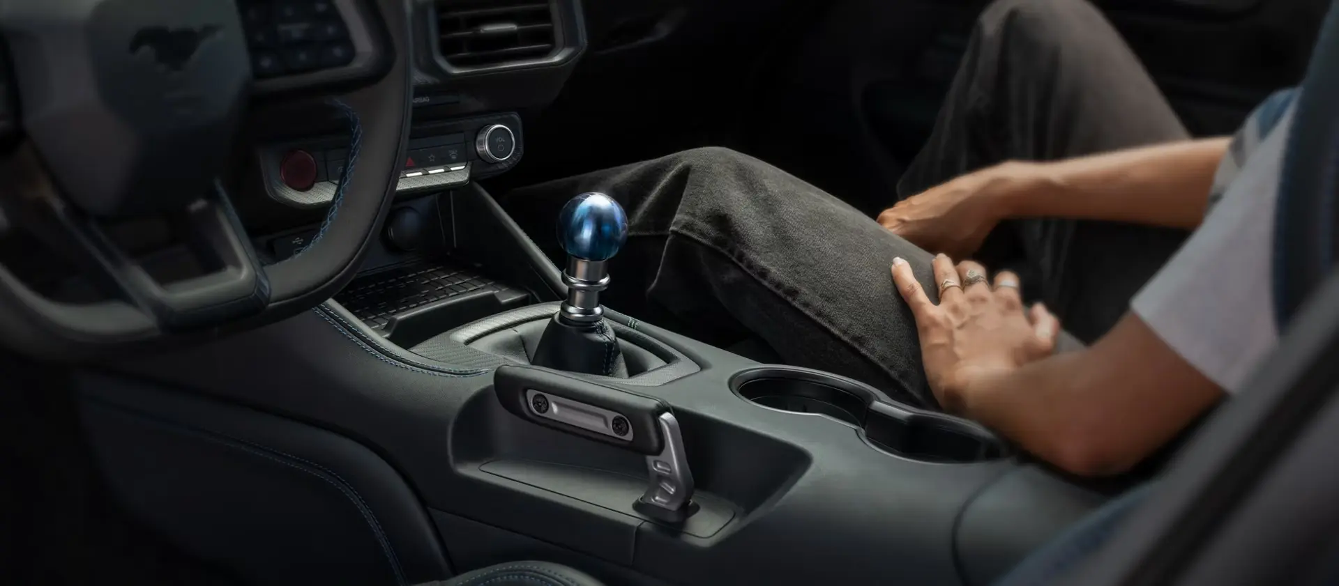 Ford Mustang interior with the manual shifter and center console