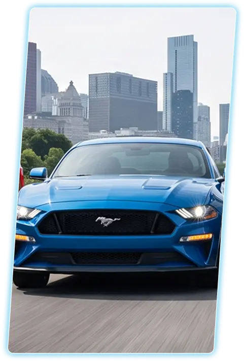 Ford Mustang front view against a city skyline