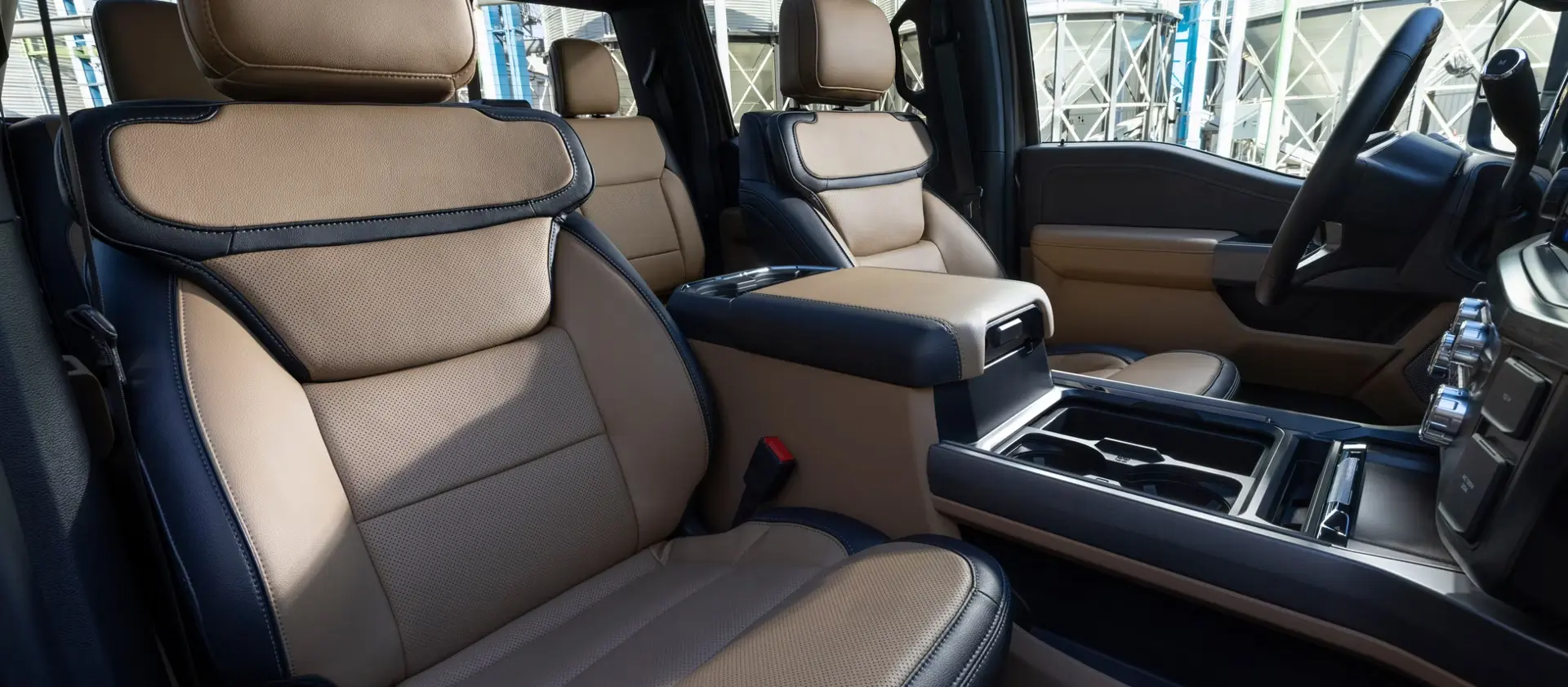 Ford Super Duty interior with leather seats and center console