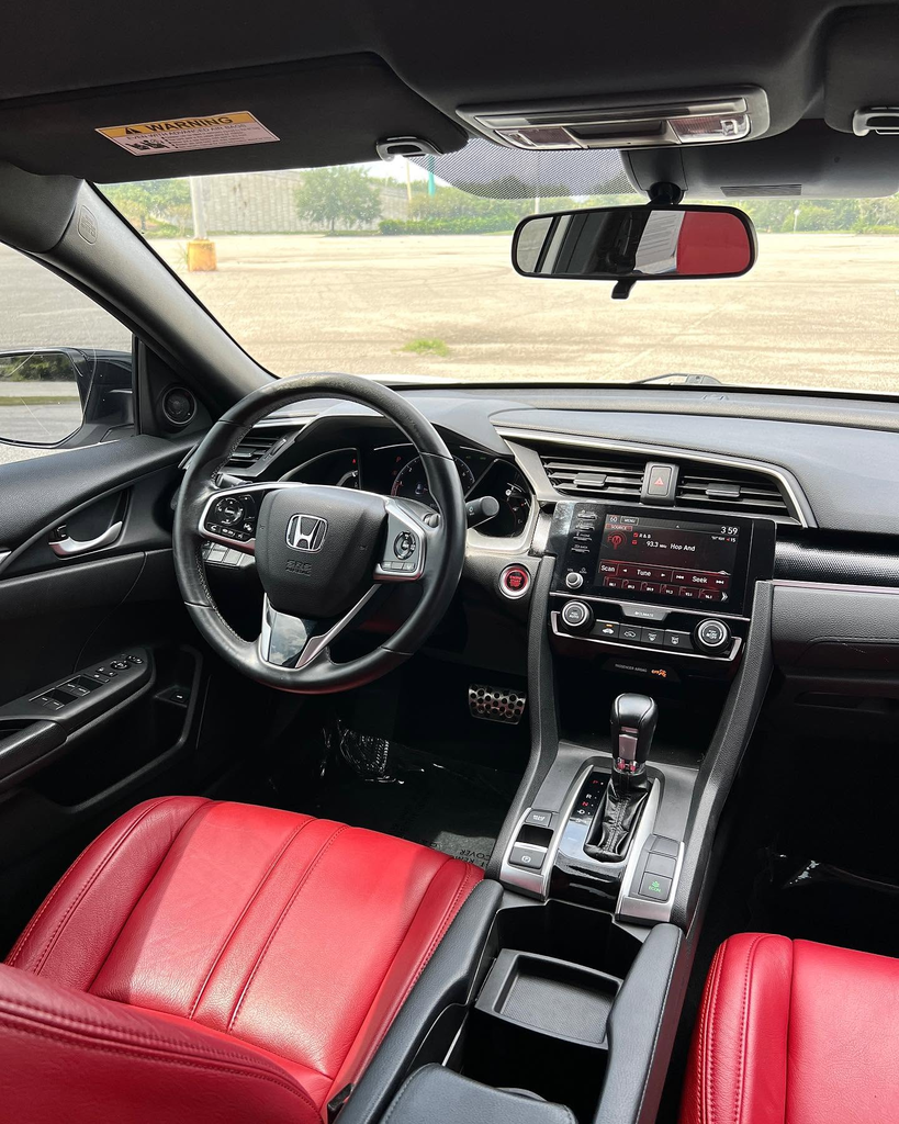 Honda Civic Sport interior dashboard, instrument cluster and centre screen.