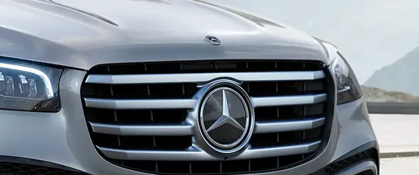 Close-up of the Mercedes-Benz GLS grille and three-pointed star emblem