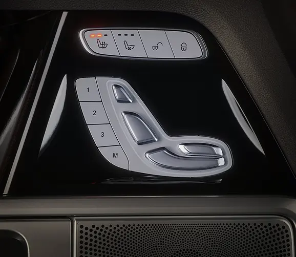 Mercedes-Benz G-Class door panel with seat adjustment controls
