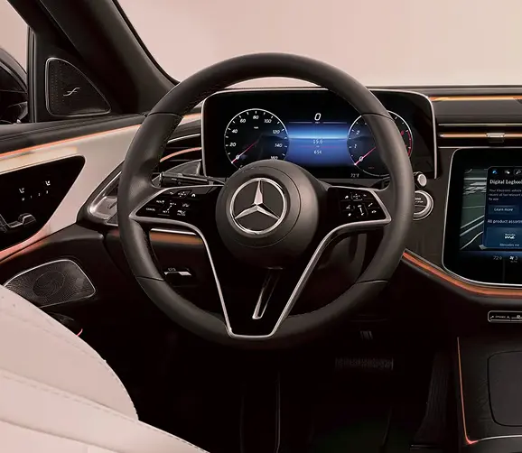 Mercedes-Benz E-Class steering wheel and digital gauge cluster