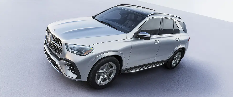 Silver Mercedes-Benz GLE SUV in a bright studio, front three-quarter view